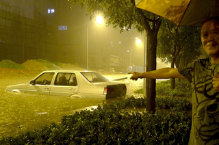 Illustration for article titled Beijing Flooding is Surreal and Awful